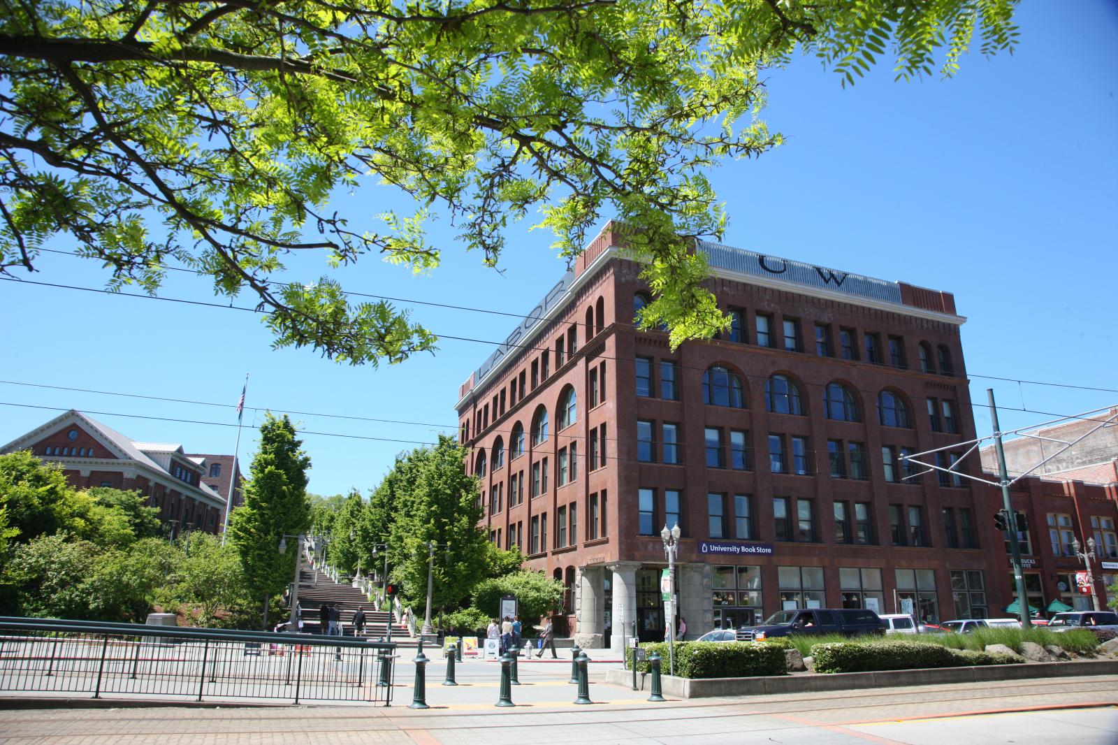 Image showing UW Tacoma academic building with a large sign on top, reading "U.W."
